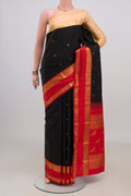 Pure Silk Black Kanjivaram Saree with Zari Butta on the body and Ganga Jamuna Border.  displayed on a mannequin