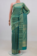 Pure Silk Turquoise Kanjivaram Saree with Zari Brocade on the body and Zari Border.  displayed on a mannequin