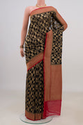 Black Banarasi Georgette Saree with Zari Brocade on the body and Fancy Border.  displayed on a mannequin