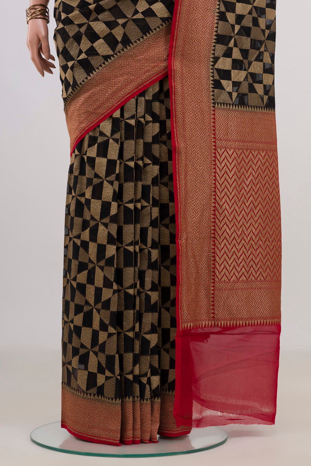 Pleats and pallu of Black Banarasi Georgette Saree with Zari Brocade on the body and Fancy Border. 