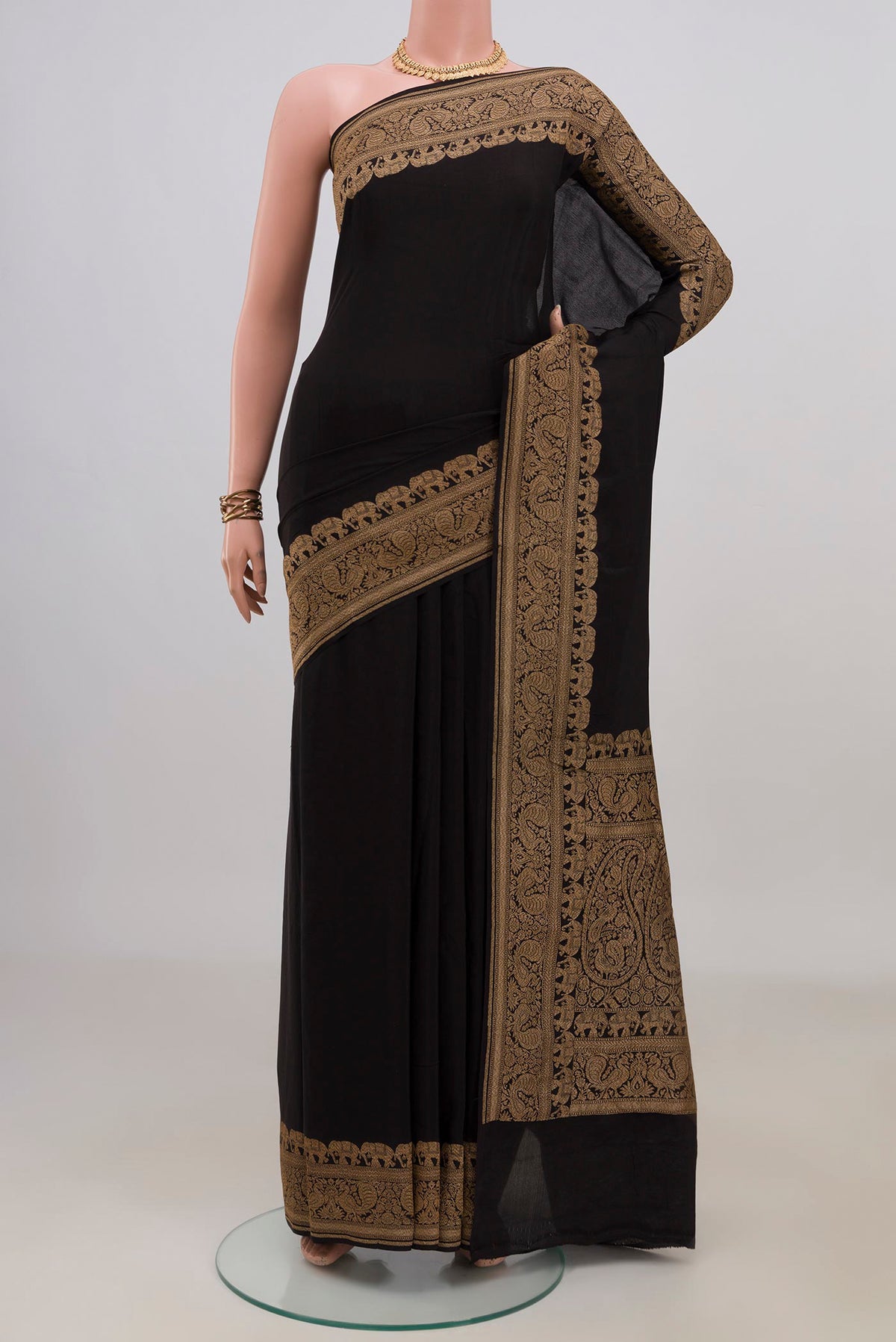 Black Banarasi Georgette Saree with Plain Body and Fancy Border.  displayed on a mannequin