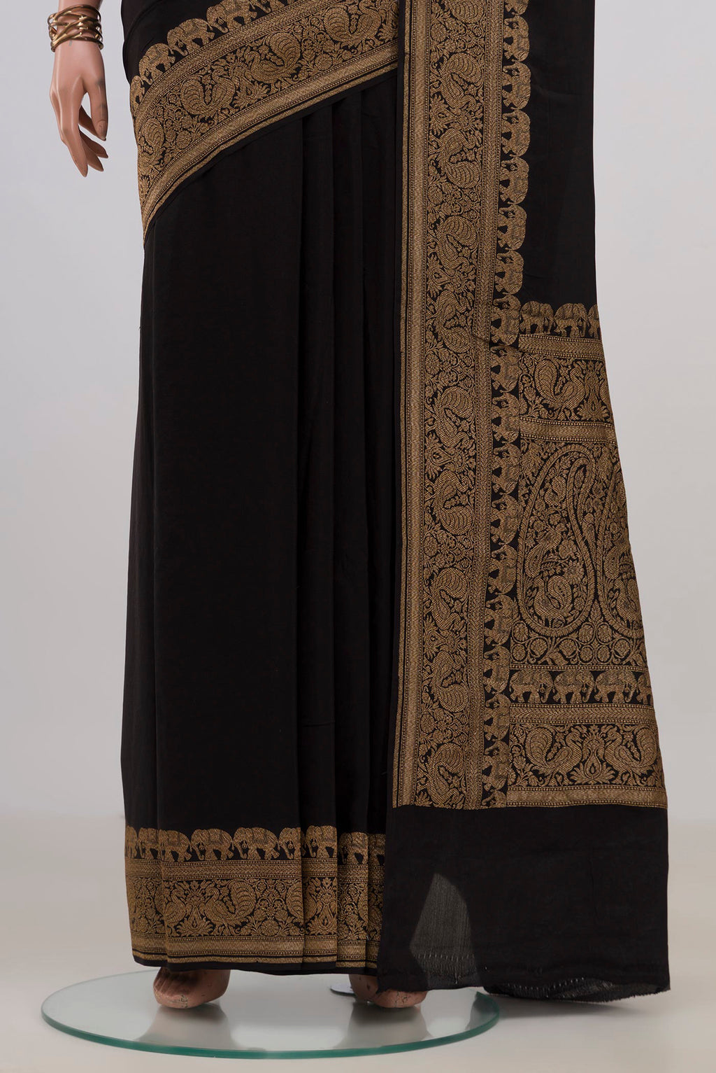Pleats and pallu of Black Banarasi Georgette Saree with Plain Body and Fancy Border. 