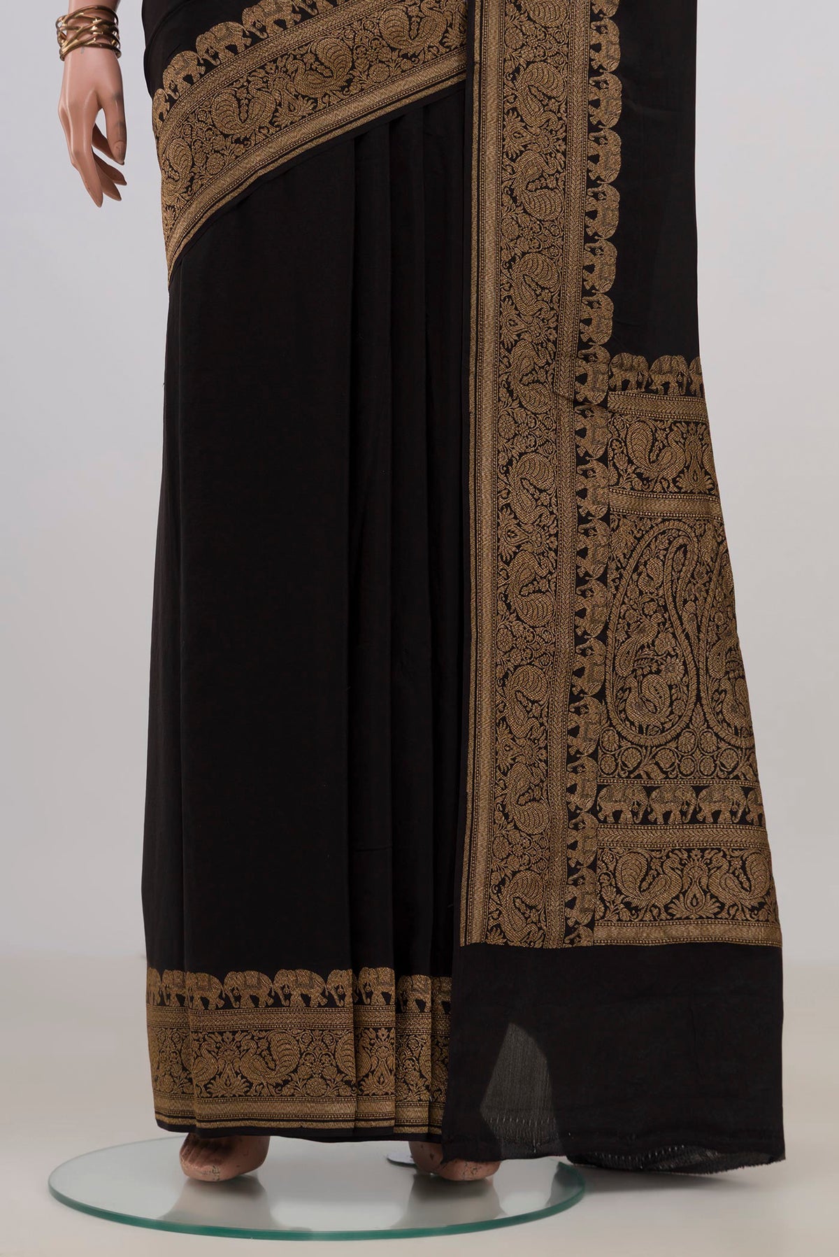 Pleats and pallu of Black Banarasi Georgette Saree with Plain Body and Fancy Border. 