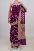 Purple Banarasi Georgette Saree with Zari Butta on the body and Fancy Border.  displayed on a mannequin