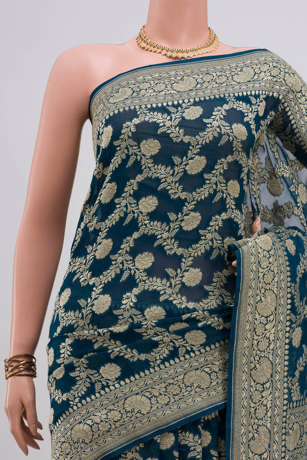 Border image of Blue Georgette Saree with Fancy on the body and Fancy Border. 