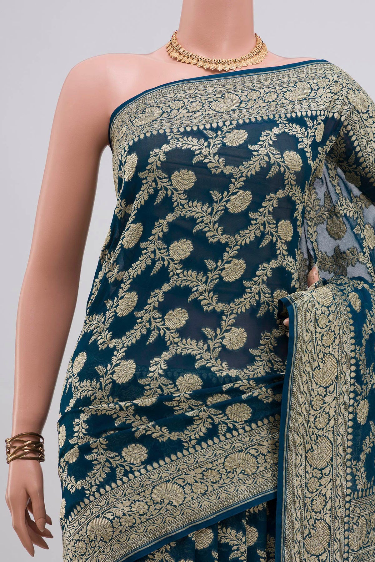 Border image of Blue Georgette Saree with Fancy on the body and Fancy Border. 
