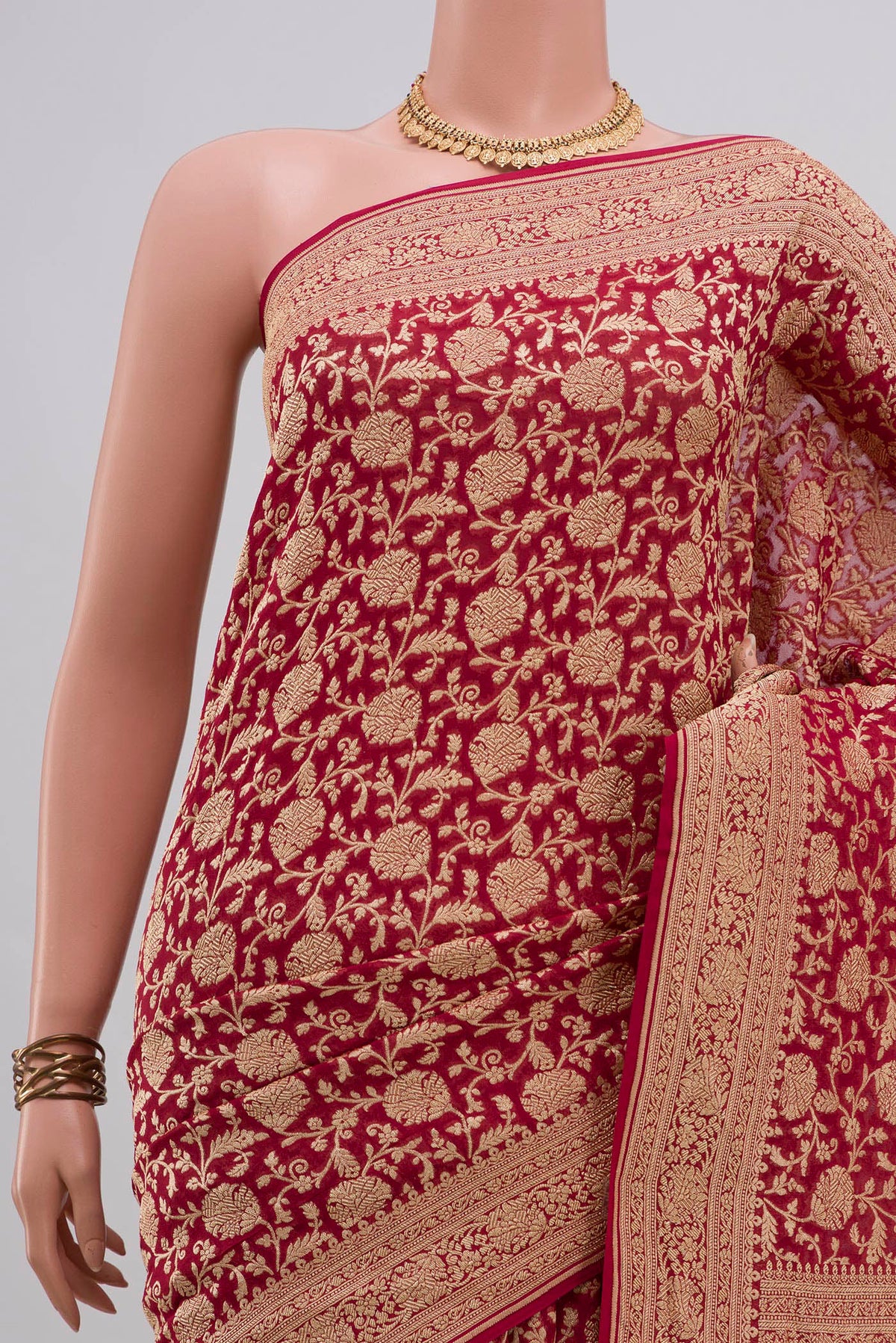 Border image of Red Georgette Saree with Fancy on the body and Fancy Border. 