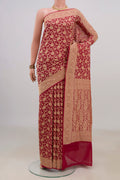 Red Georgette Saree with Fancy on the body and Fancy Border.  displayed on a mannequin