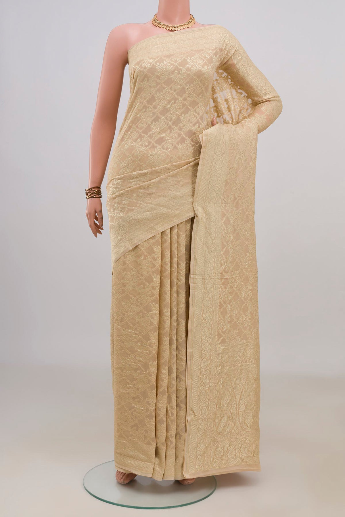 Sandal Banarasi Georgette Saree with Zari Brocade on the body and Fancy Border.  displayed on a mannequin