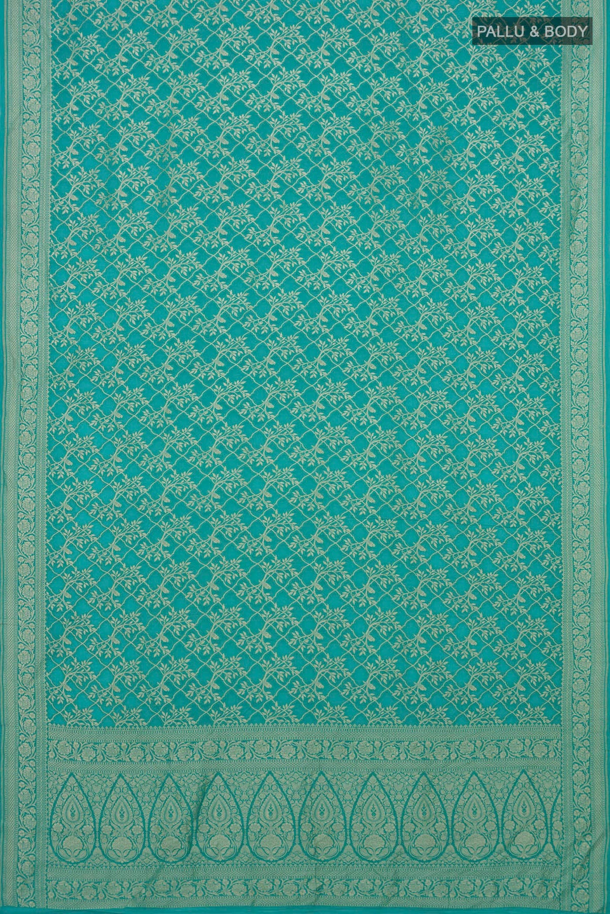 Flat view of Turquoise Banarasi Georgette Saree with Zari Brocade on the body and Fancy Border. 