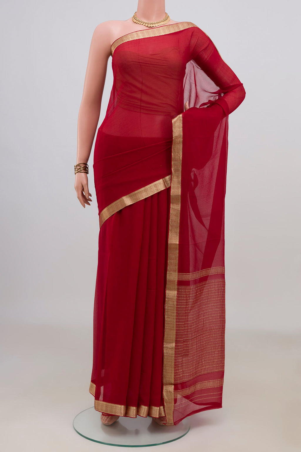 Red Mysore Chiffon Saree with Plain Body and Zari Border.  displayed on a mannequin