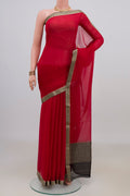 Red Mysore Chiffon Saree with Plain Body and Zari Border.  displayed on a mannequin