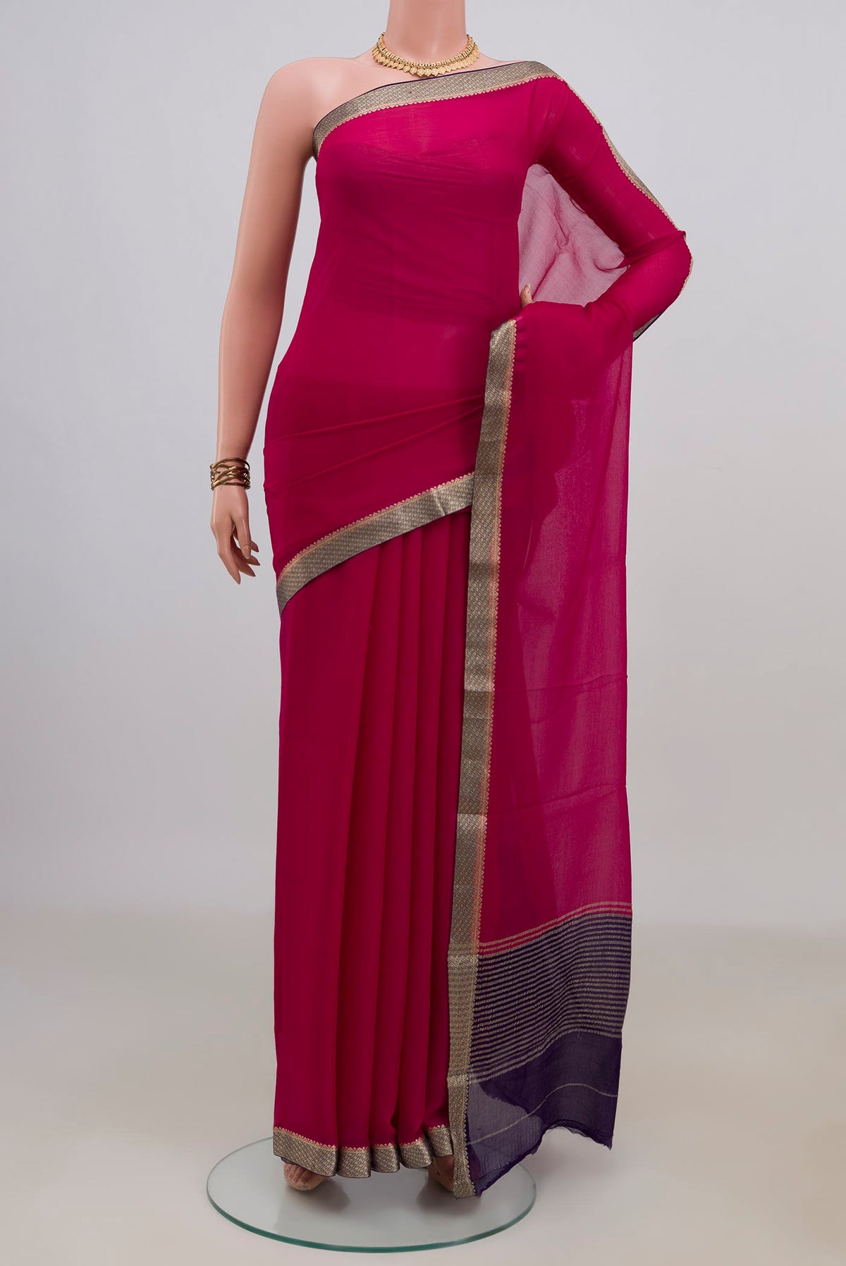 Pink Mysore Chiffon Saree with Plain Body and Zari Border.  displayed on a mannequin