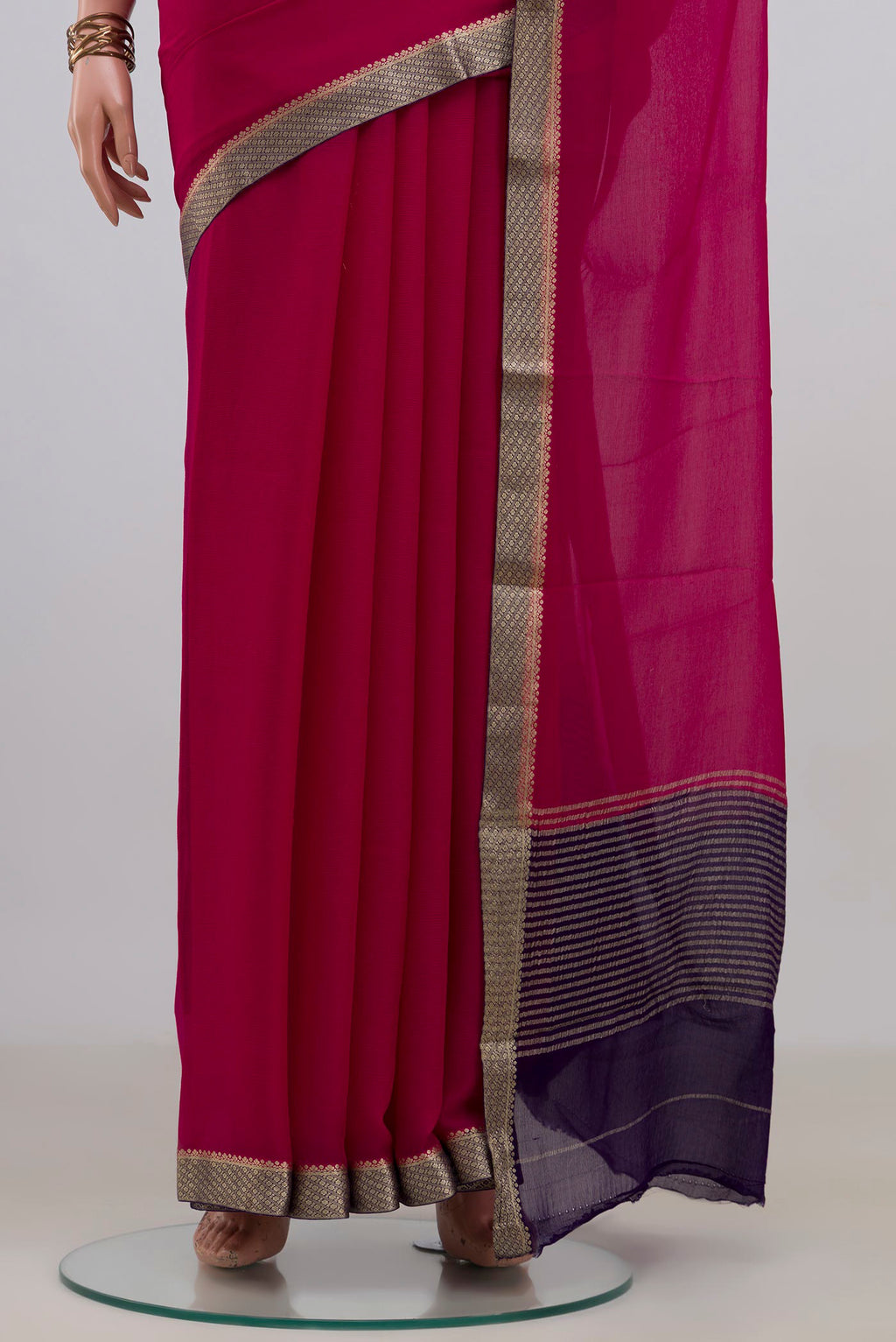 Pleats and pallu of Pink Mysore Chiffon Saree with Plain Body and Zari Border. 