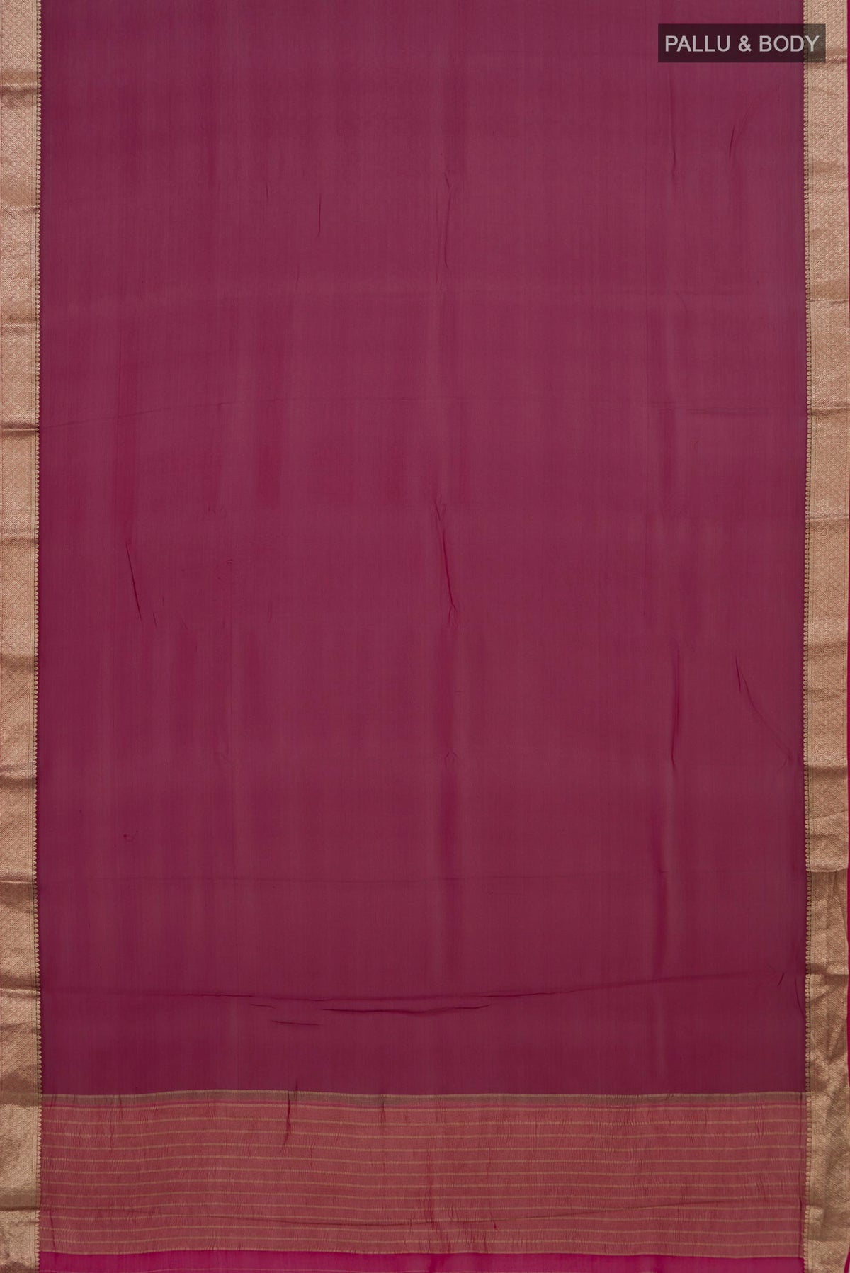 Flat view of Magenta Mysore Chiffon Saree with Plain Body and Zari Border. 