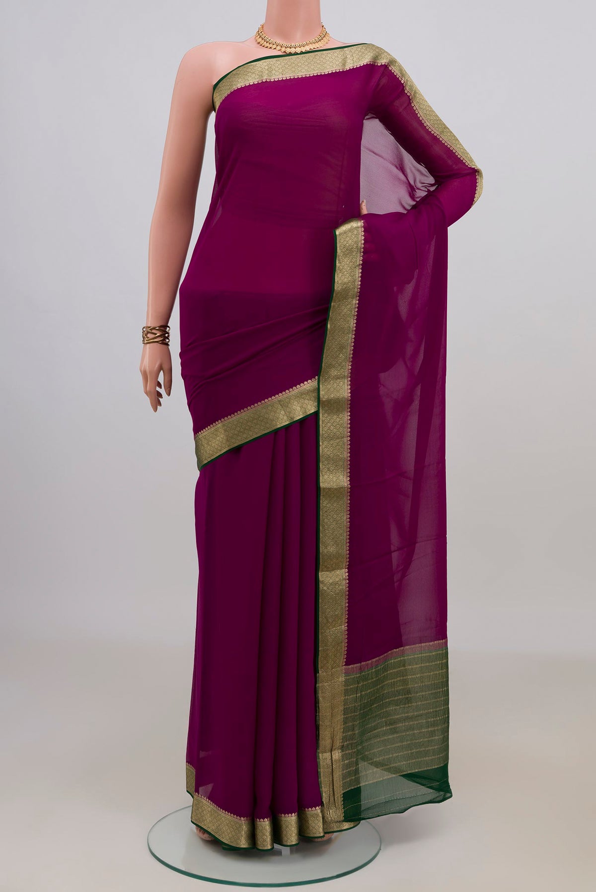 Magenta Mysore Chiffon Saree with Plain Body and Zari Border.  displayed on a mannequin