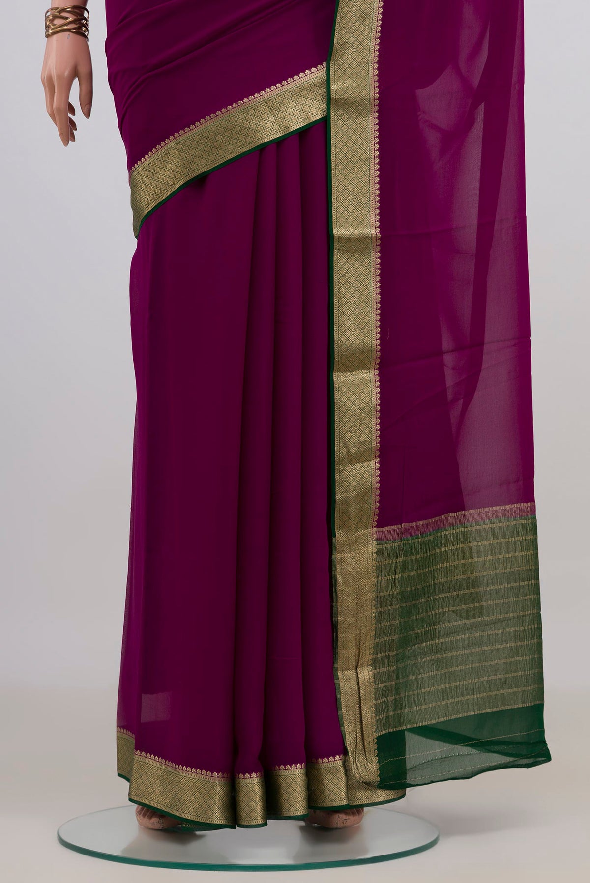 Pleats and pallu of Magenta Mysore Chiffon Saree with Plain Body and Zari Border. 