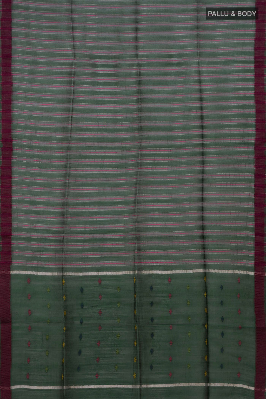 Flat view of Pure Silk Green Tussar Saree with Thread Butta on the body and Thread Border. 