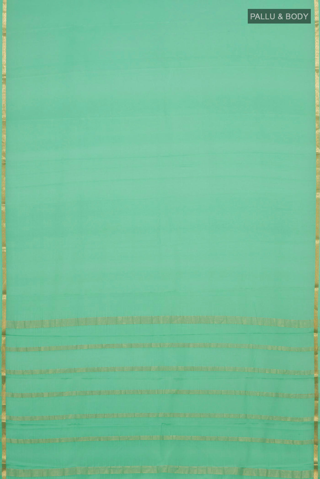 Flat view of Mint Green Mysore Crepe Saree with Plain Body and Thin Zari Line. 