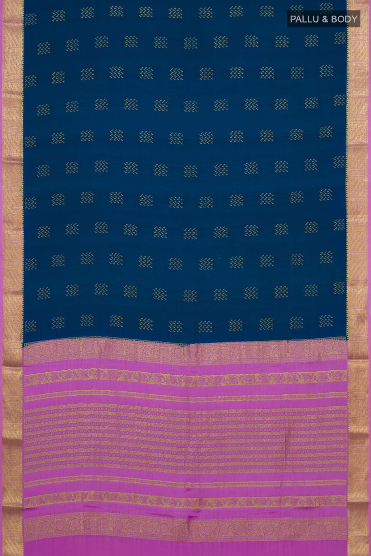Flat view of Blue Mysore Crepe Saree with Zari Butta on the body and Zari Border. 