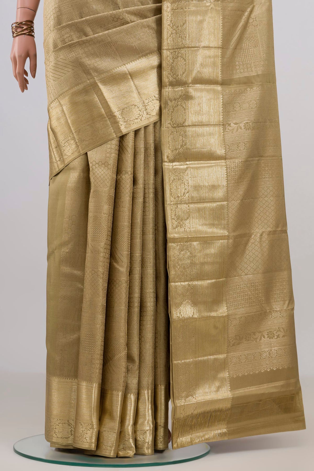 Pleats and pallu of Pure Silk Golden Kanjivaram Saree with Zari Brocade on the body and Zari Border. 