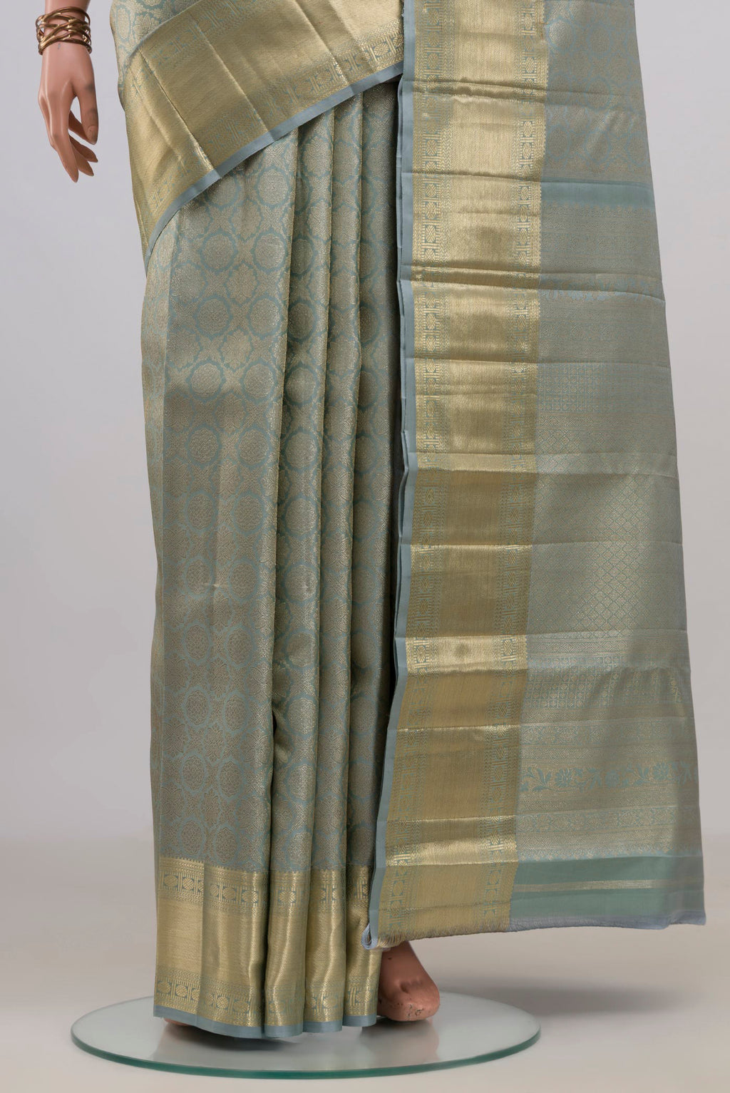 Pleats and pallu of Pure Silk Grey Kanjivaram Saree with Zari Brocade on the body and Zari Border. 