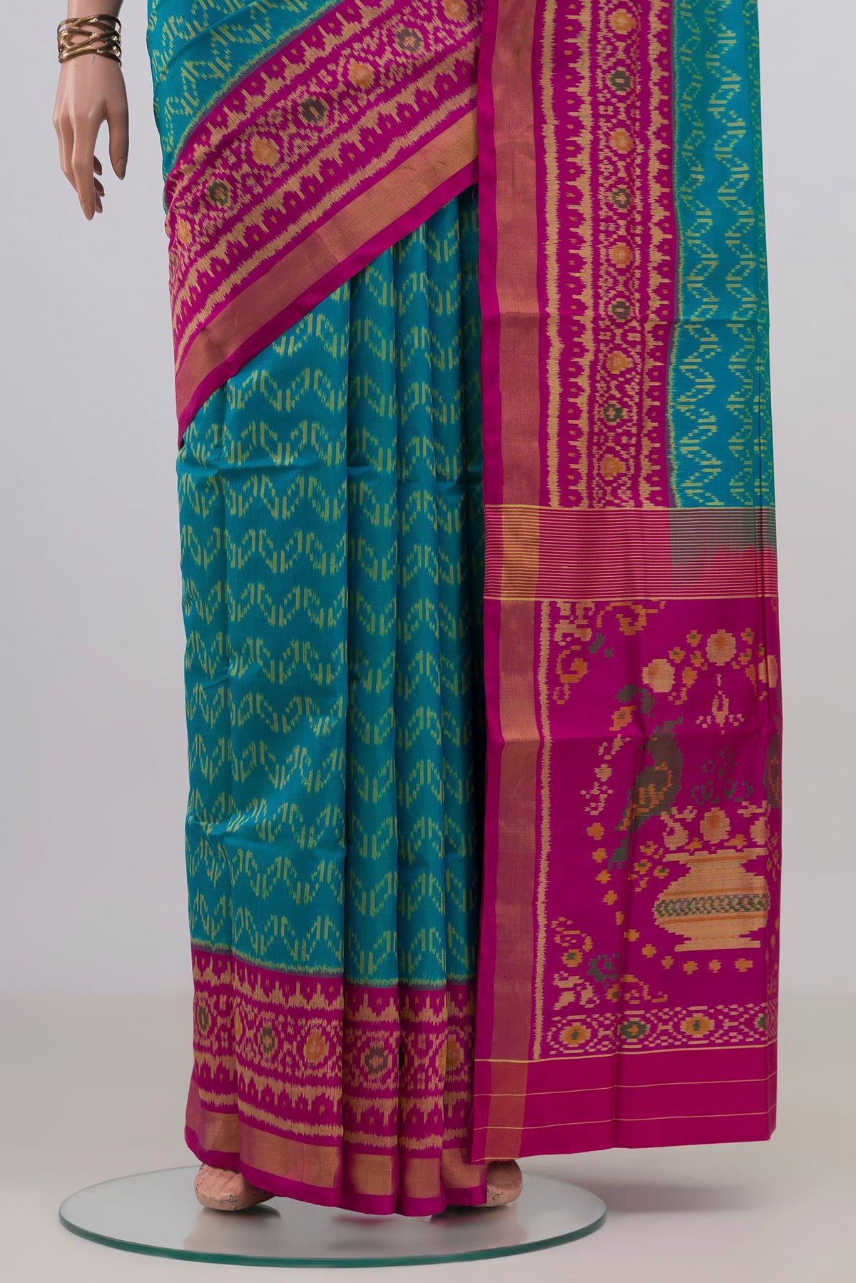 Pleats and pallu of Pure Silk Blue Rajkot Patola Saree with Ikat design on the body and Ikat Border. 
