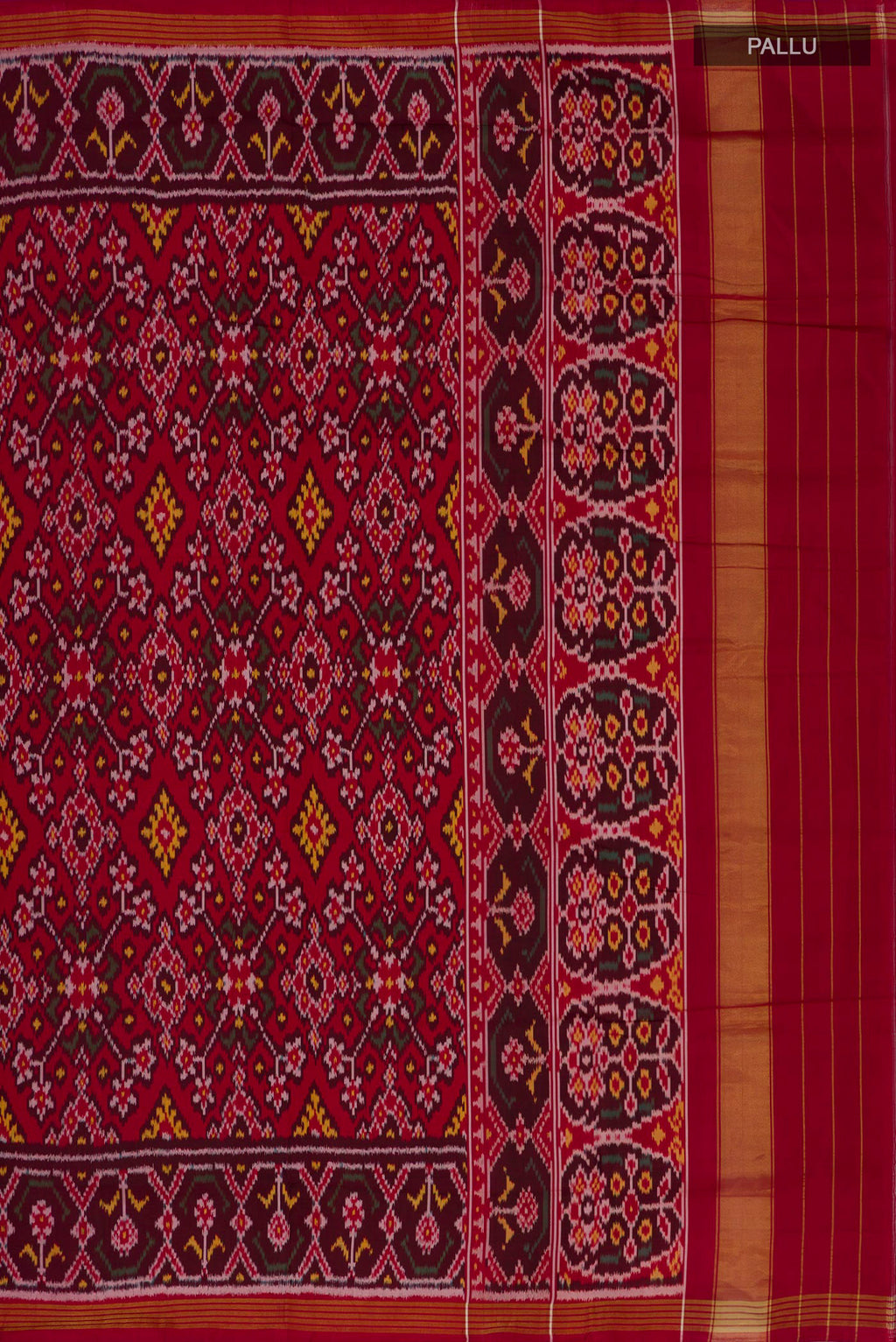 Close up image of the pallu of Pure Silk Maroon Rajkot Patola Saree with Ikat design on the body and Ikat Border. 
