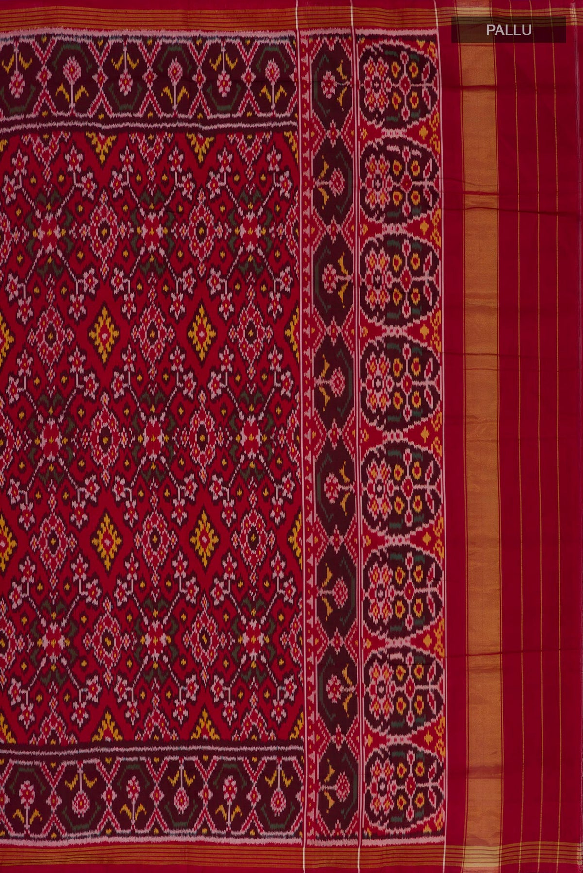 Close up image of the pallu of Pure Silk Maroon Rajkot Patola Saree with Ikat design on the body and Ikat Border. 