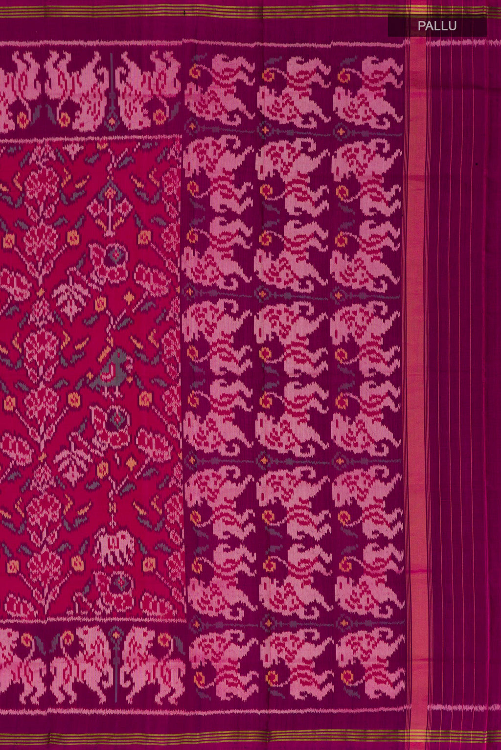 Close up image of the pallu of Pure Silk Pink Rajkot Patola Saree with Ikat design on the body and Ikat Border. 