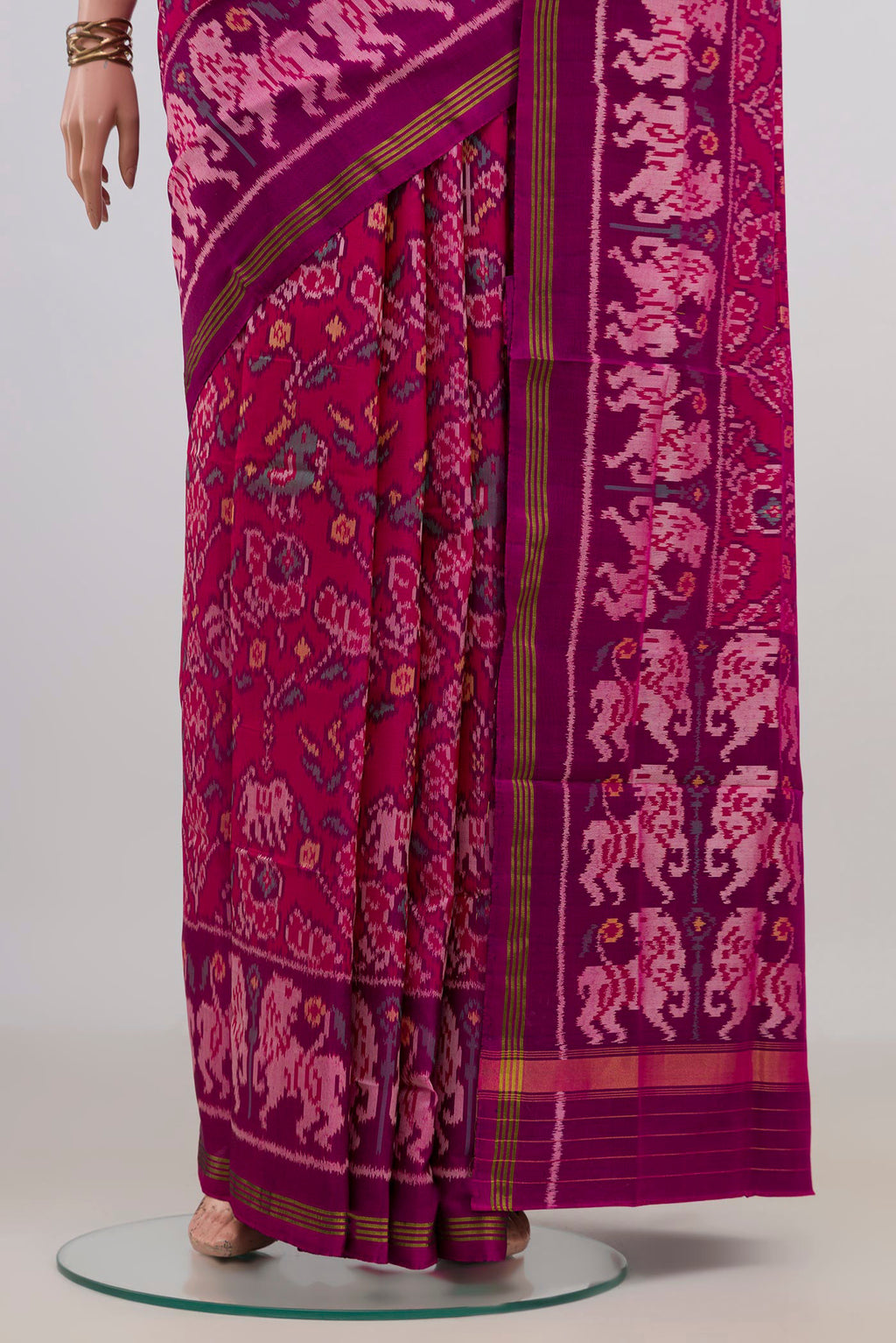 Pleats and pallu of Pure Silk Pink Rajkot Patola Saree with Ikat design on the body and Ikat Border. 