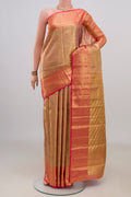 Golden Dual Tone Kanchipuram Saree with Zari Brocade on the body and Zari Border.  displayed on a mannequin