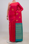 Pure Silk Pink Kanchipuram Saree with Zari Butta on the body and Without Border.  displayed on a mannequin