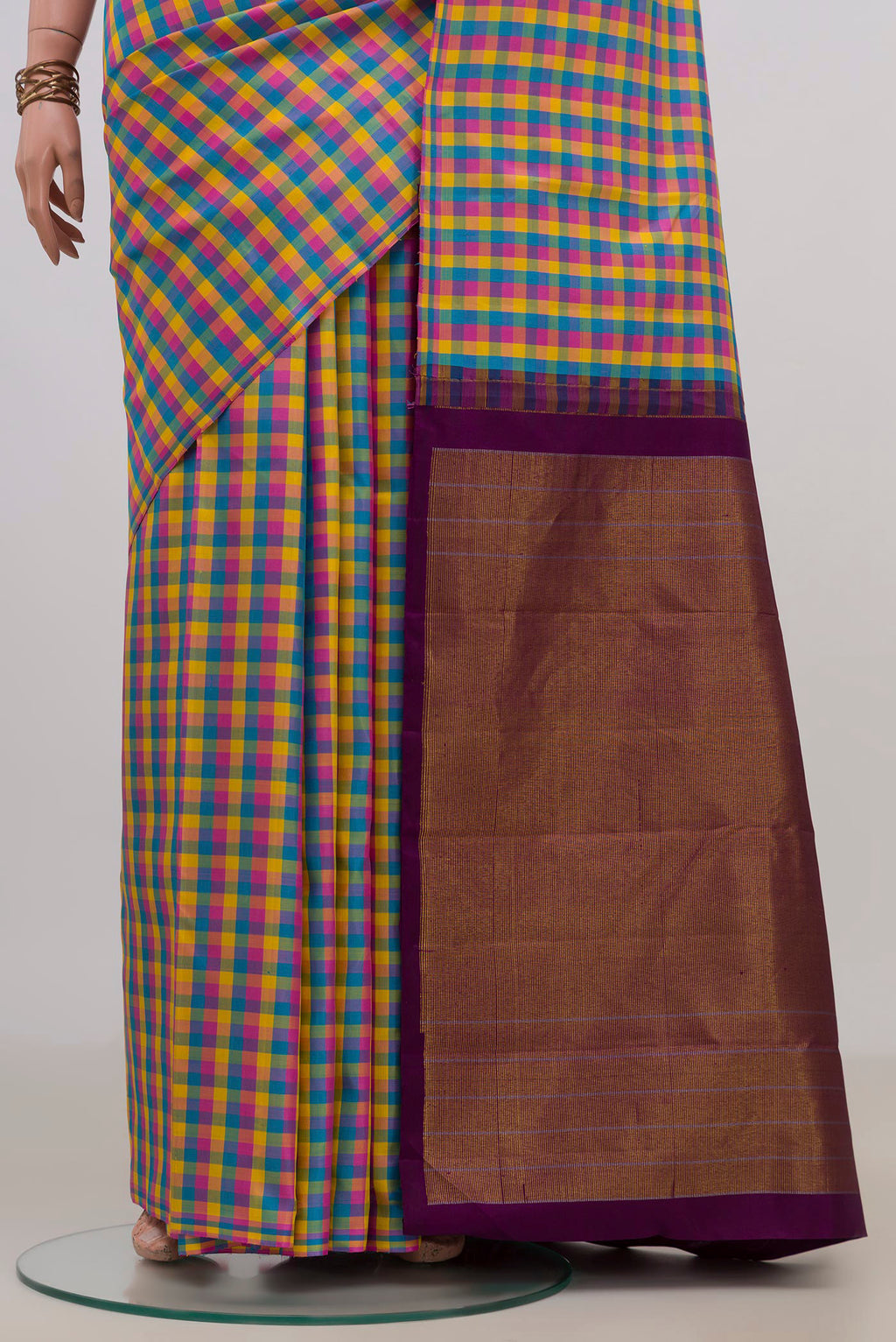 Pleats and pallu of Pure Silk Multi Color Kanchipuram Saree with Checked design on the body and Without Border. 