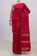 Pure Silk Pure Zari Maroon Kanjivaram Saree with Checked design on the body and Thin Zari Line.  displayed on a mannequin