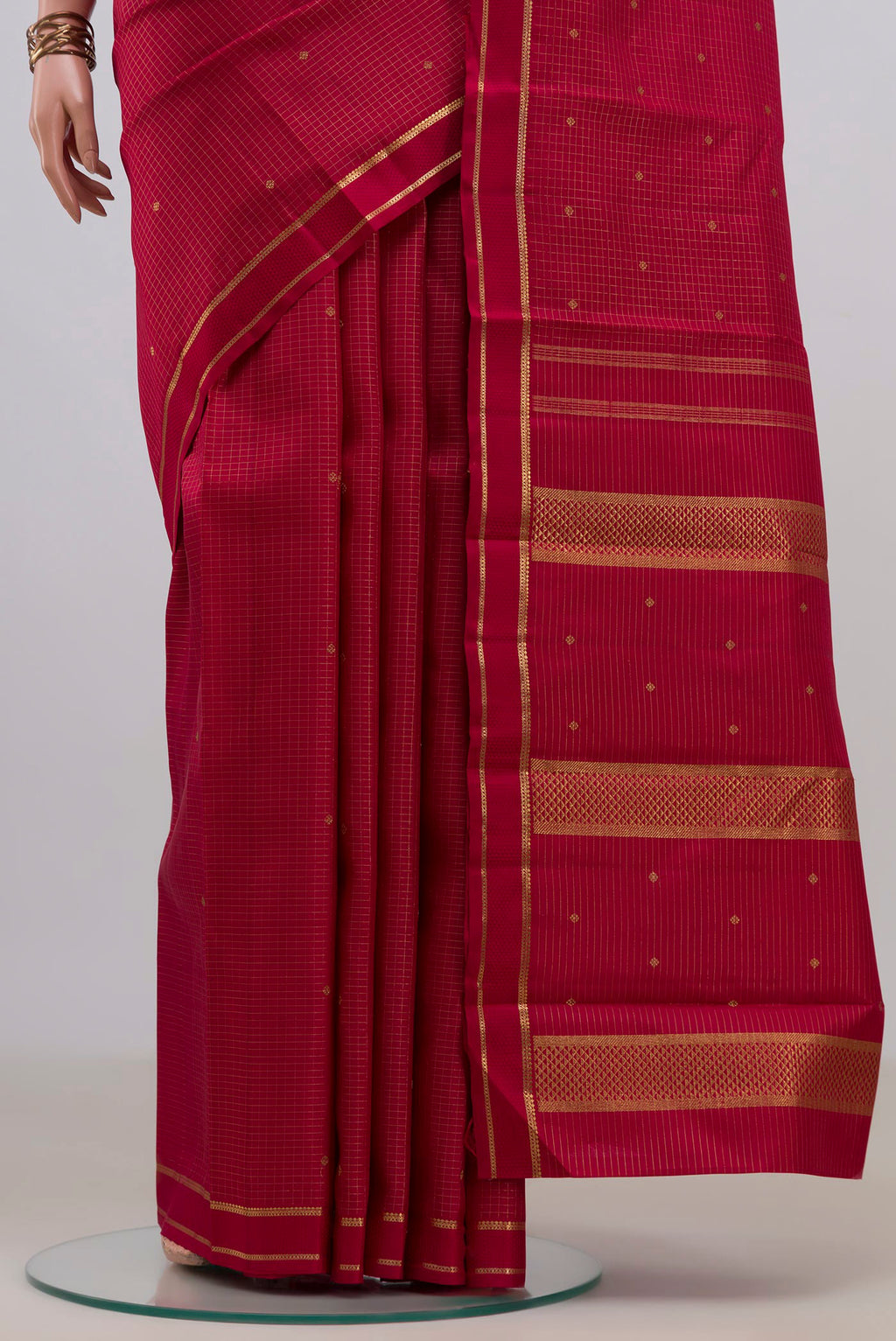 Pleats and pallu of Pure Silk Pure Zari Maroon Kanjivaram Saree with Checked design on the body and Thin Zari Line. 