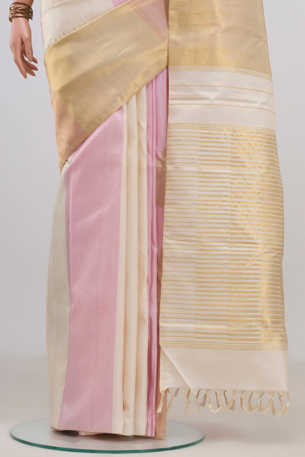 Pleats and pallu of Pure Silk Multi Color Kanjivaram Saree with Fancy on the body and Rising Temple Border. 