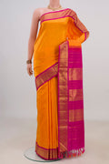 Pure Silk Yellow Kanchipuram Nine Yards Saree with Plain Body and Zari Border.  displayed on a mannequin