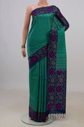 Pure Silk Green Soft Saree with Fancy on the body and Fancy Border.  displayed on a mannequin