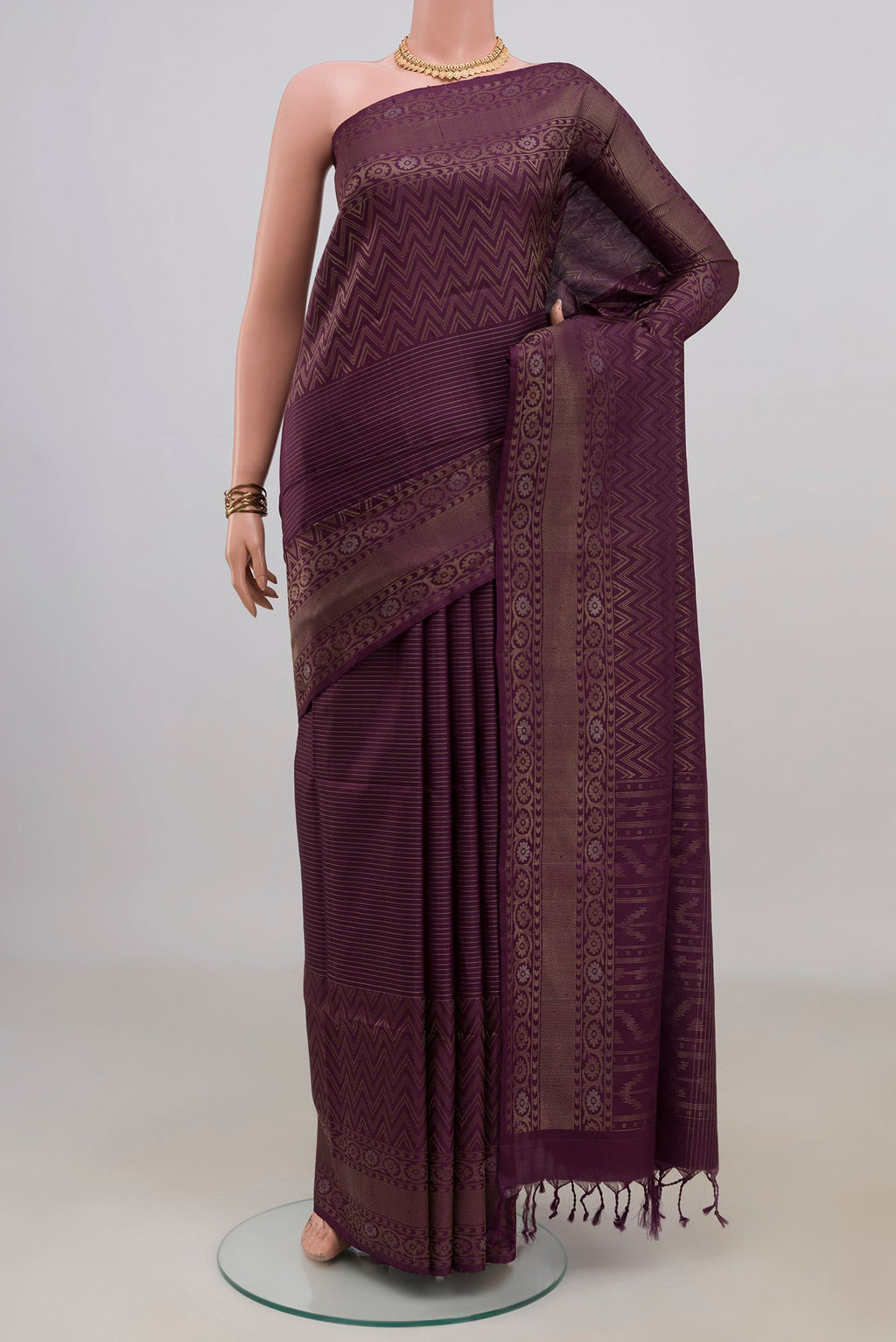 Pure Silk Purple Soft Saree with Stripes on the body and Fancy Border.  displayed on a mannequin