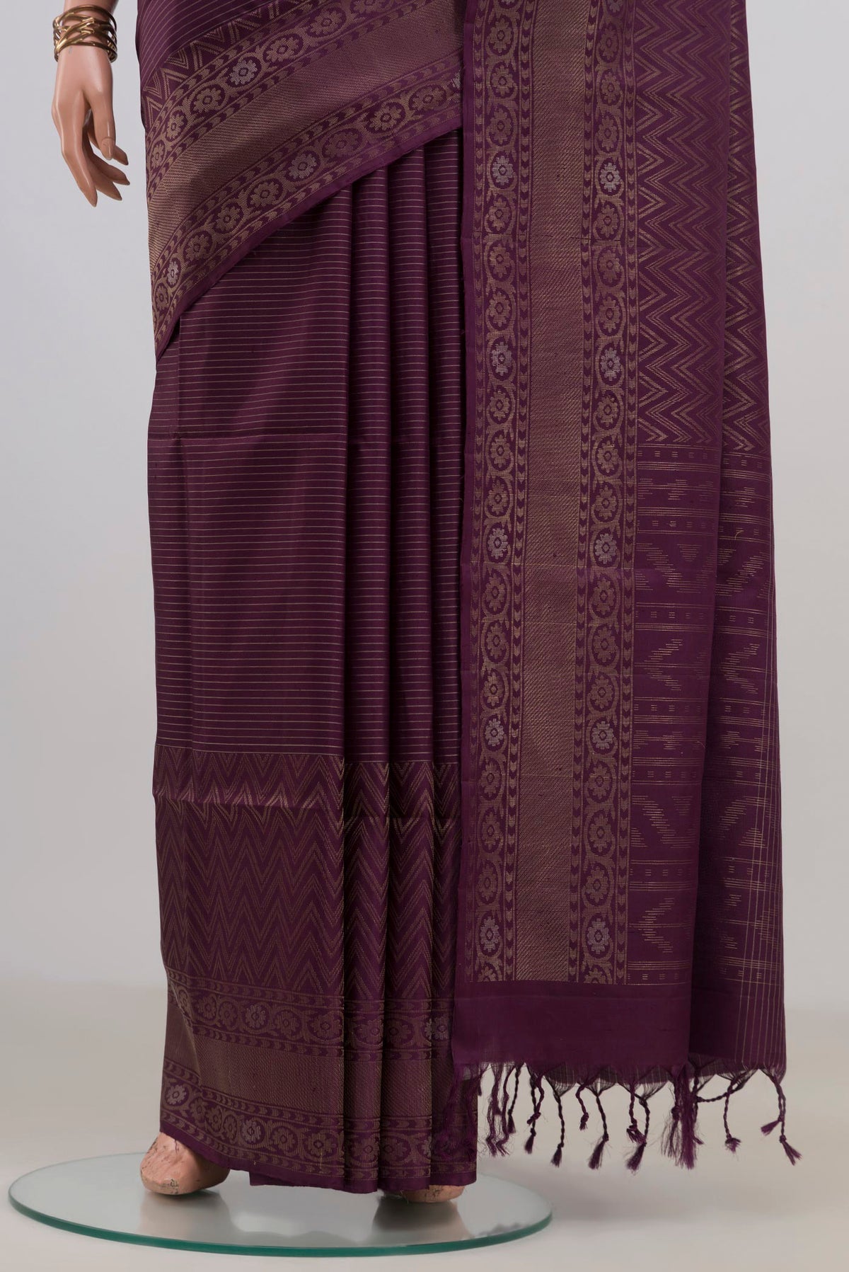 Pleats and pallu of Pure Silk Purple Soft Saree with Stripes on the body and Fancy Border. 