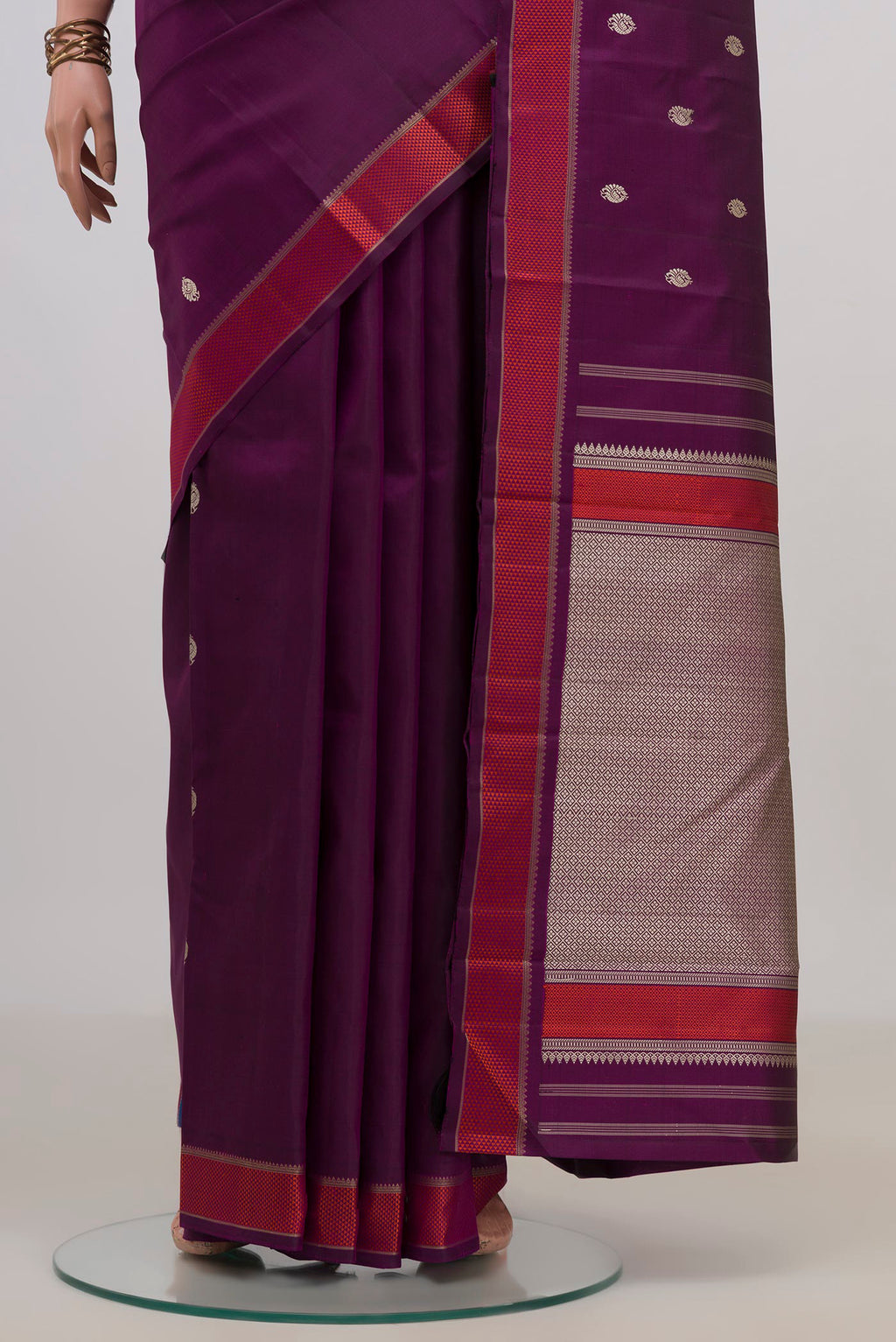 Pleats and pallu of Pure Silk Purple Kanjivaram Saree with Thread Butta on the body and Thread Border. 