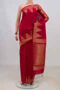 Pure Silk Maroon Soft Saree with Plain Body and Temple Border.  displayed on a mannequin