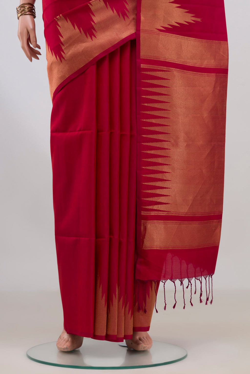 Pleats and pallu of Pure Silk Maroon Soft Saree with Plain Body and Temple Border. 