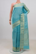 Pure Silk Light Blue Kanjivaram Saree with Zari Butta on the body and Zari Border.  displayed on a mannequin