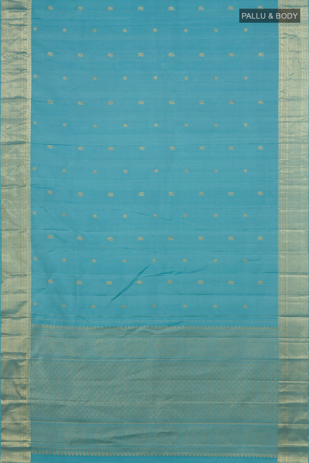 Flat view of Pure Silk Light Blue Kanjivaram Saree with Zari Butta on the body and Zari Border. 