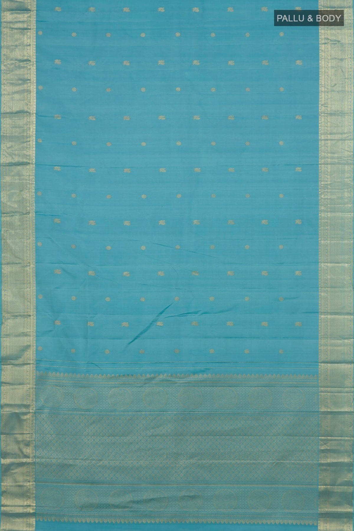 Flat view of Pure Silk Light Blue Kanjivaram Saree with Zari Butta on the body and Zari Border. 