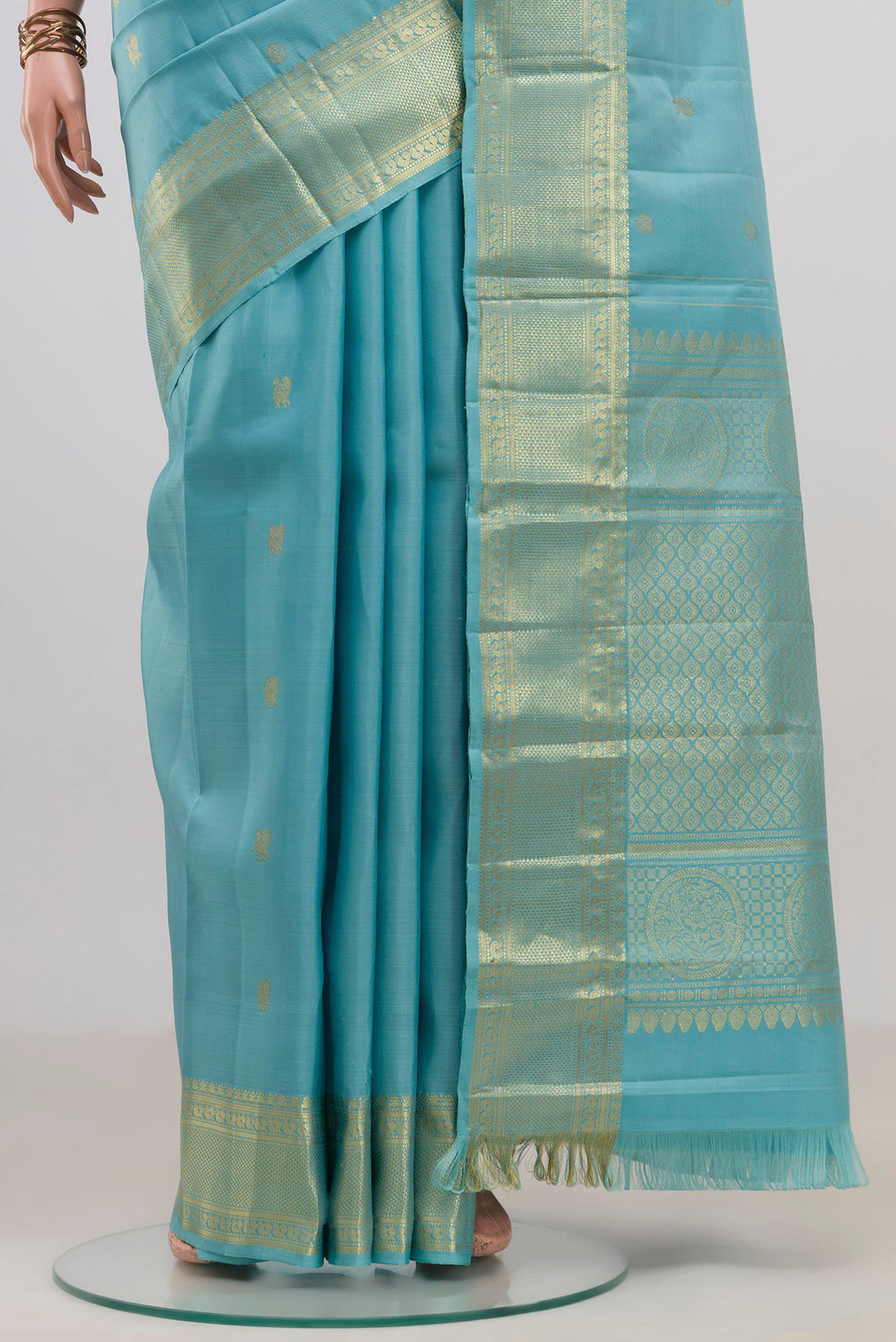 Pleats and pallu of Pure Silk Light Blue Kanjivaram Saree with Zari Butta on the body and Zari Border. 