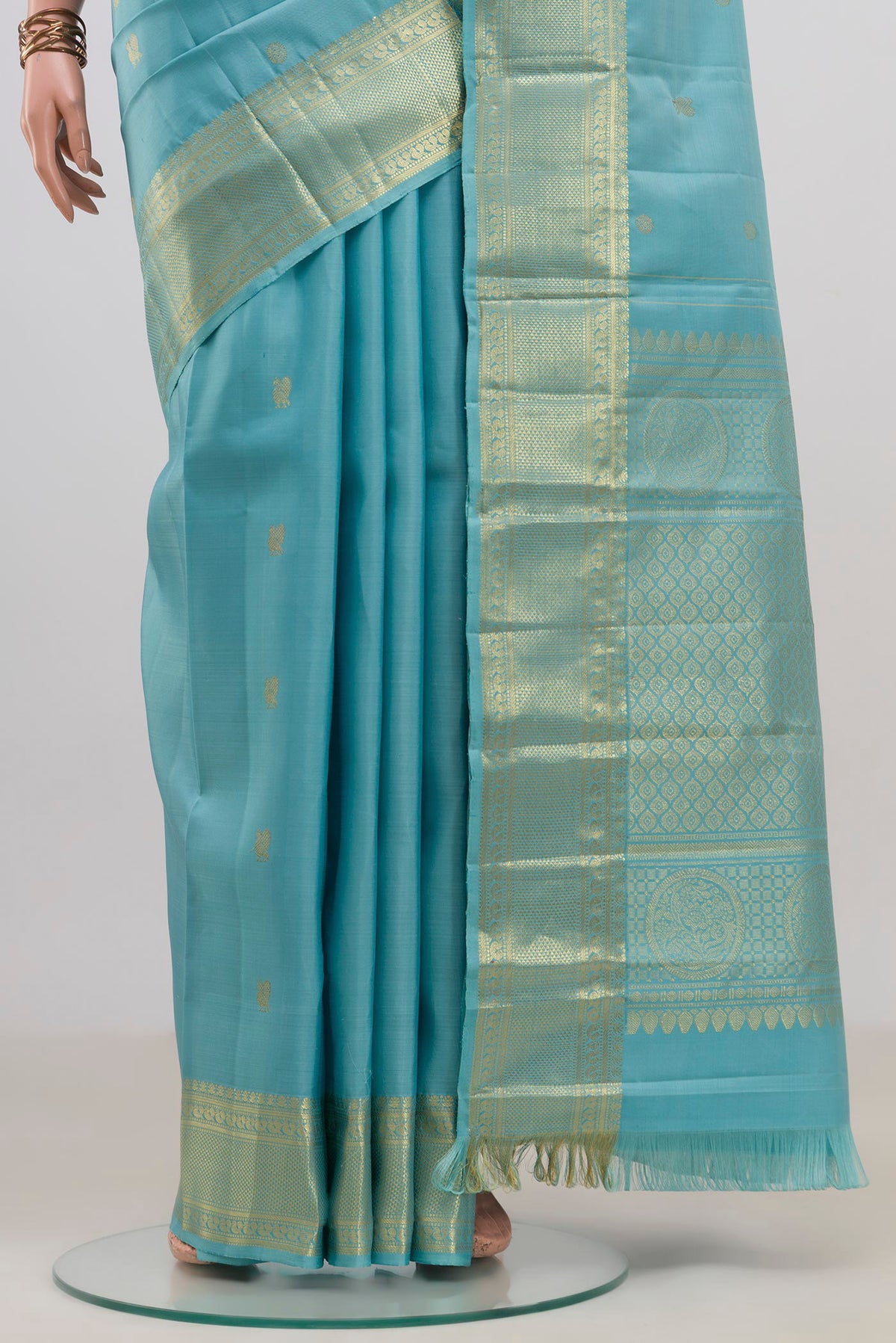 Pleats and pallu of Pure Silk Light Blue Kanjivaram Saree with Zari Butta on the body and Zari Border. 