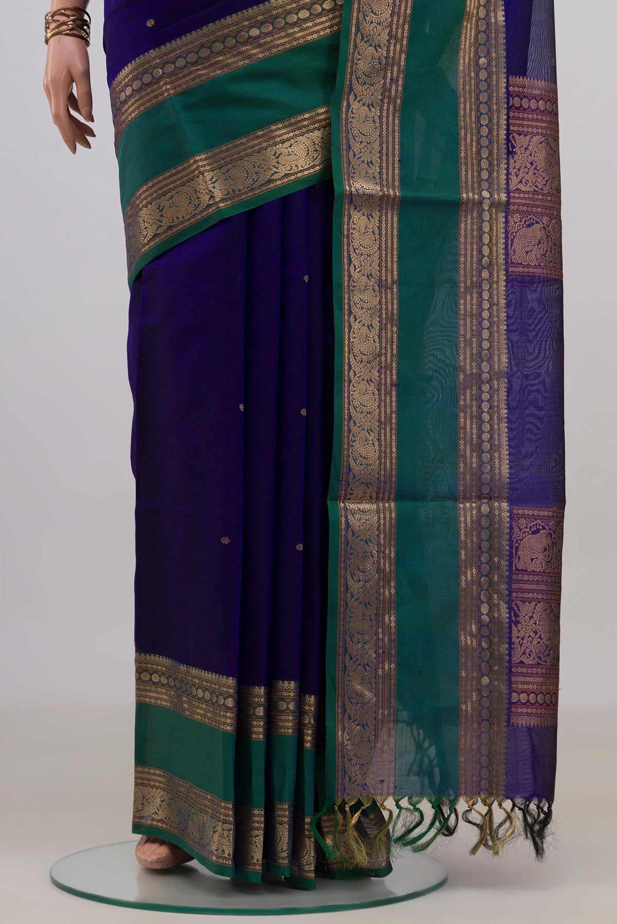 Pleats and pallu of Royal Blue Silk Cotton Saree with Thread Butta on the body and Zari Border. 